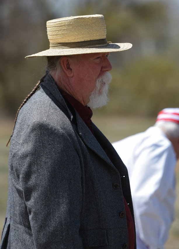 -Arbiter (umpire) Ferrill "Mad Dog" Mason, of Westminster, officiates a Colorado Vintage Base Ball game between The Denver Blue Stockings and Colorado Springs/Denver & Rio Grande Railroad May 7 at South Platte Historical Park in Fort Lupton. The game was one of many historic exhibitions which were part of South Platte Historical Society's annual Heritage Day.
